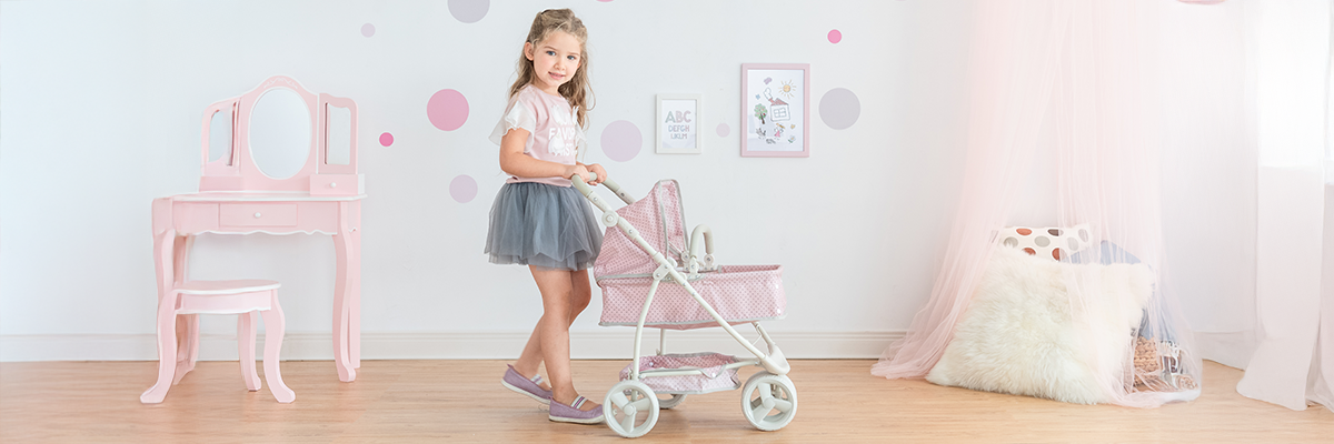 the purple jogging style stroller for baby dolls is on a walkway in a park