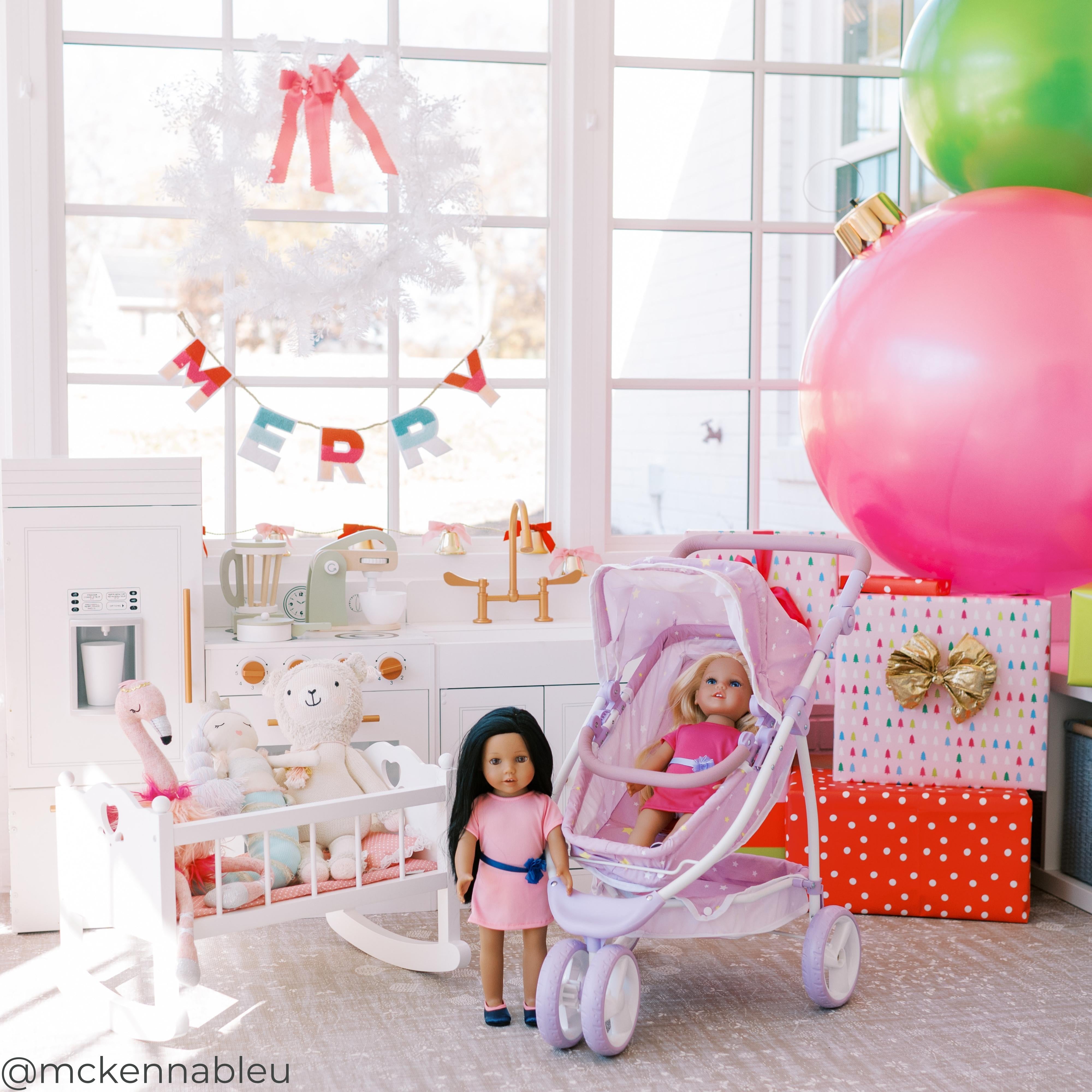 A room full of holiday decorations and toys, gifts, and dolls