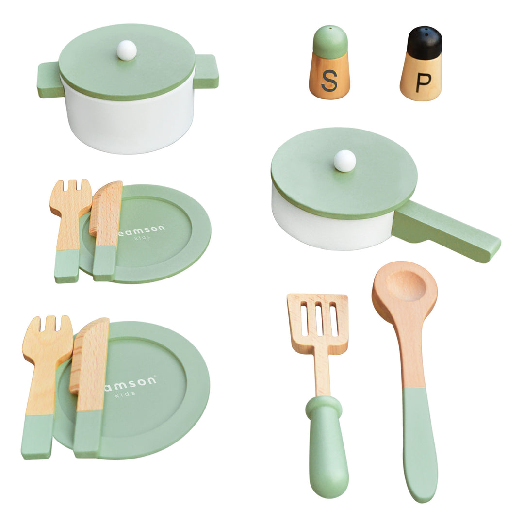 A kitchen playset with a pot, pan, plates, flatwear, spatulas, and seasoning bottles