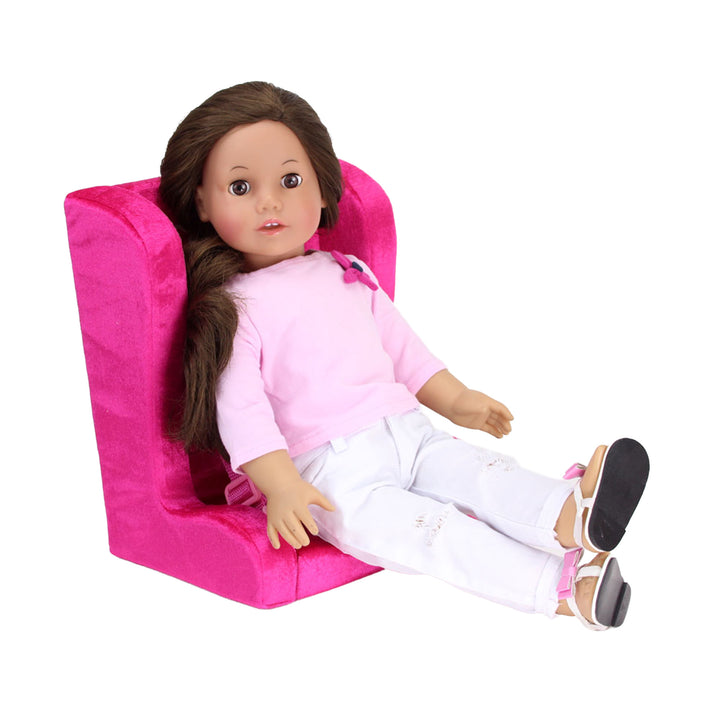 An 18" doll with brunette sitting in a hot pink car seat