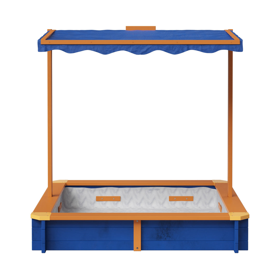 A blue and wood-toned sandbox with a blue awning over it