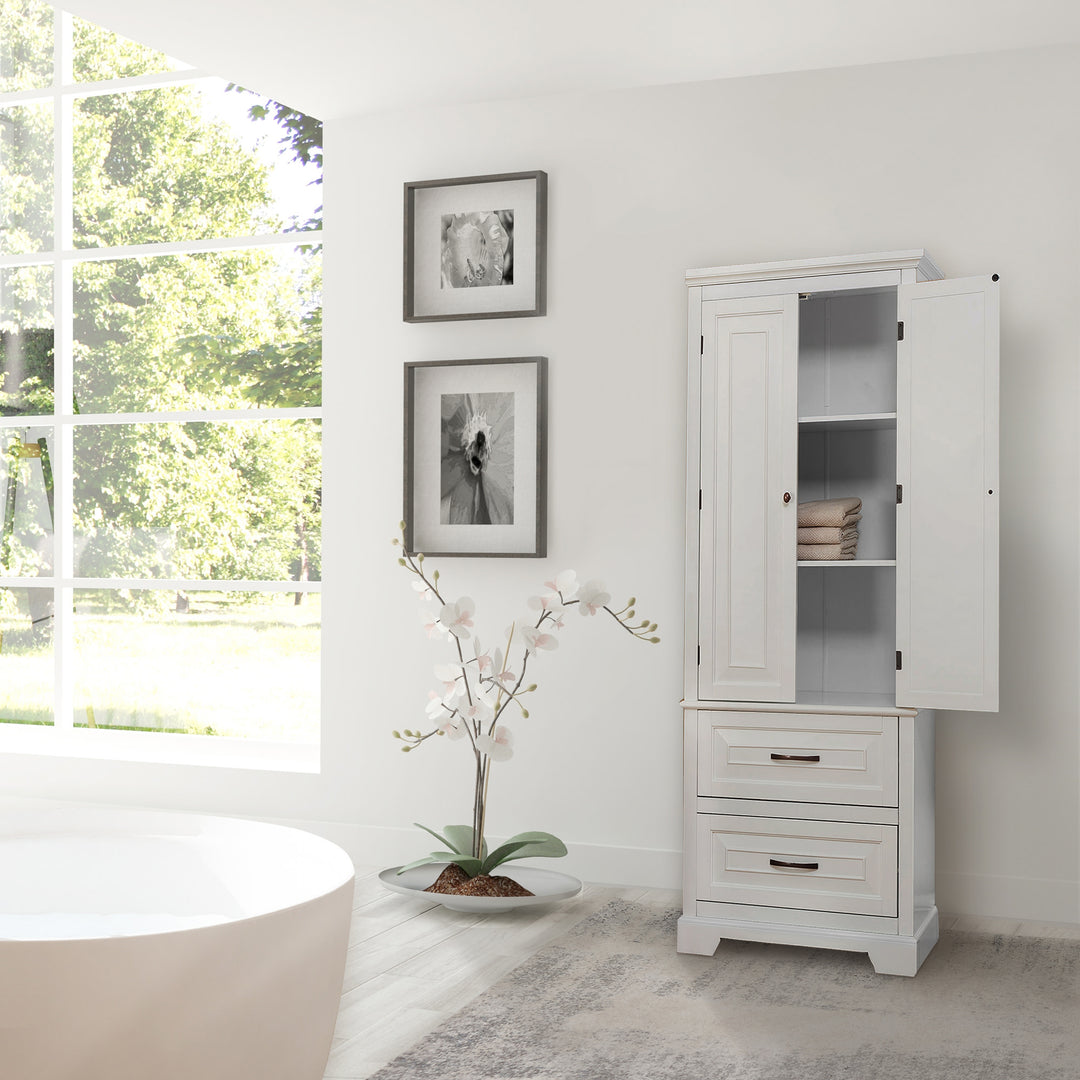 A partially opened tall white cabinet with double doors and two internal shelves in a white bathroom