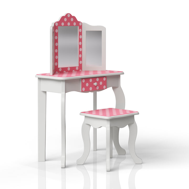 A side view of a kids' vanity table and matching stool with trifold mirror, white with pink and white polka dot accents