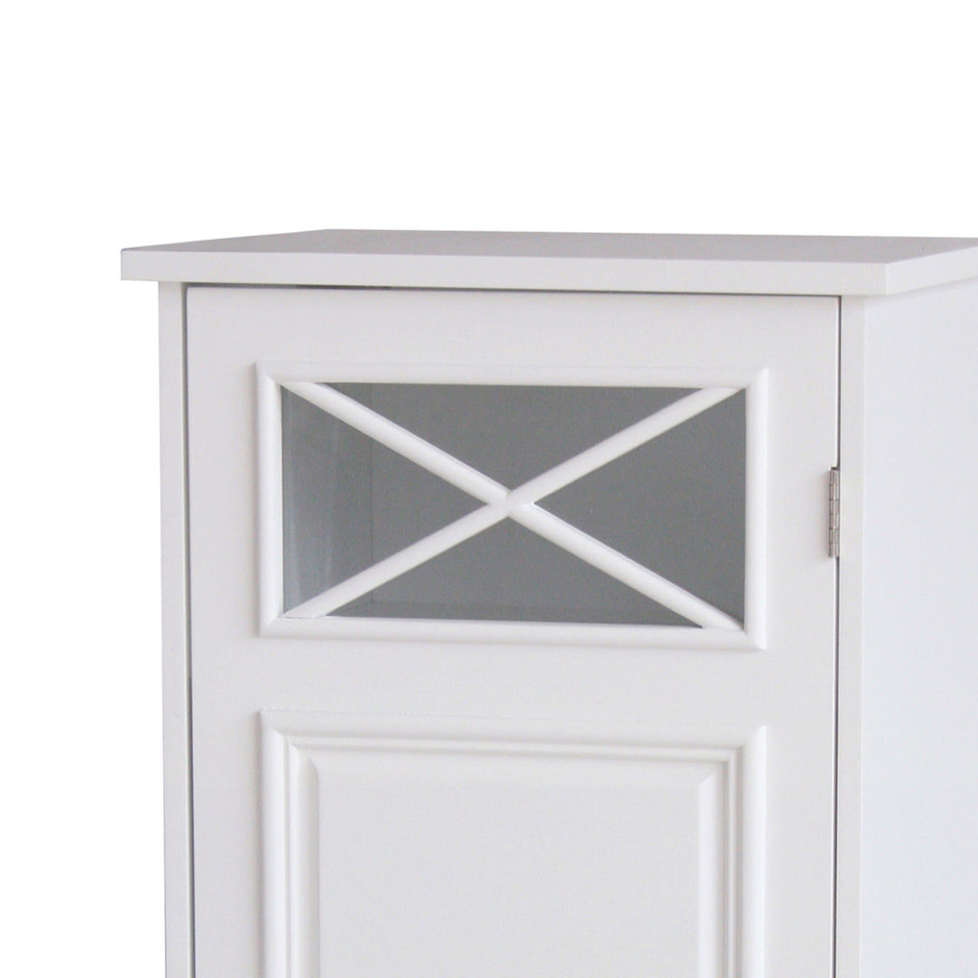 Close-up of the window in a narrow white floor cabinet's door