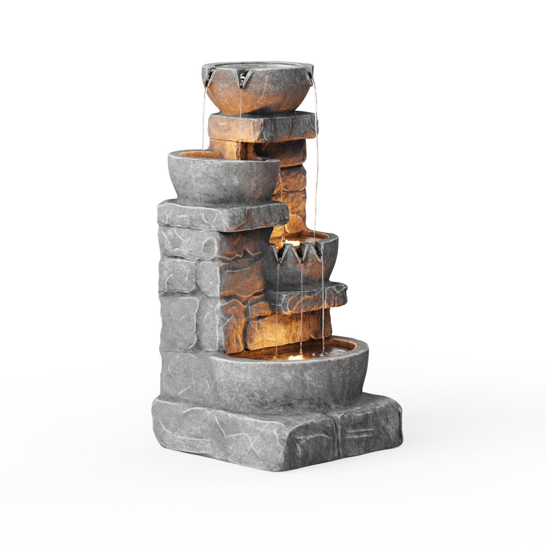 Side view of a 4-tier faux gray stone cascading water fountain