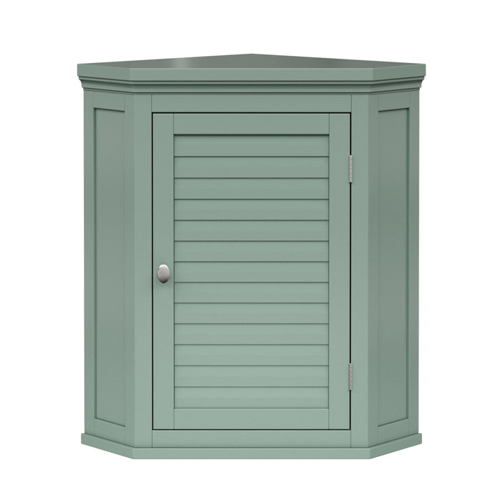 Sage green corner wall cabinet with silver hardware and faux louvered door.