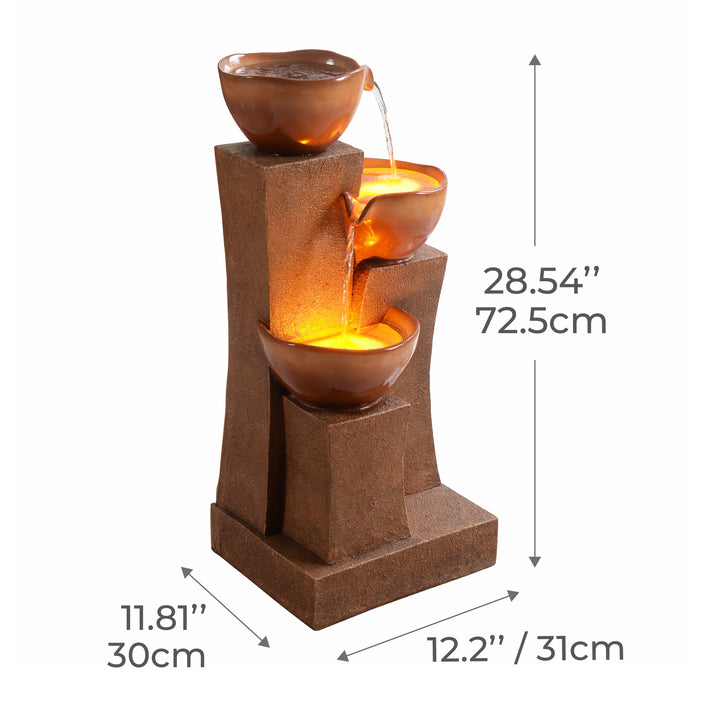 Dimensions of a three-tiered water fountain listed in inches and centimeters