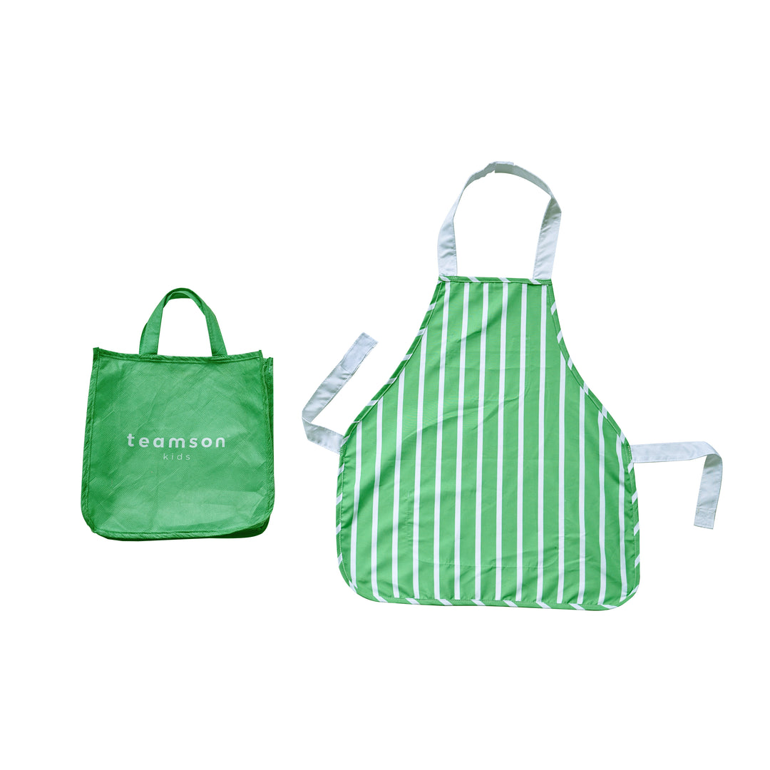 Green striped kids’ apron with white ties, shown next to matching carrying bag.