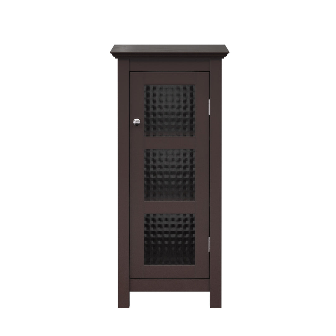 A Teamson Home Chesterfield Wooden Floor Cabinet with Waffle Glass Door, Espresso against the wall