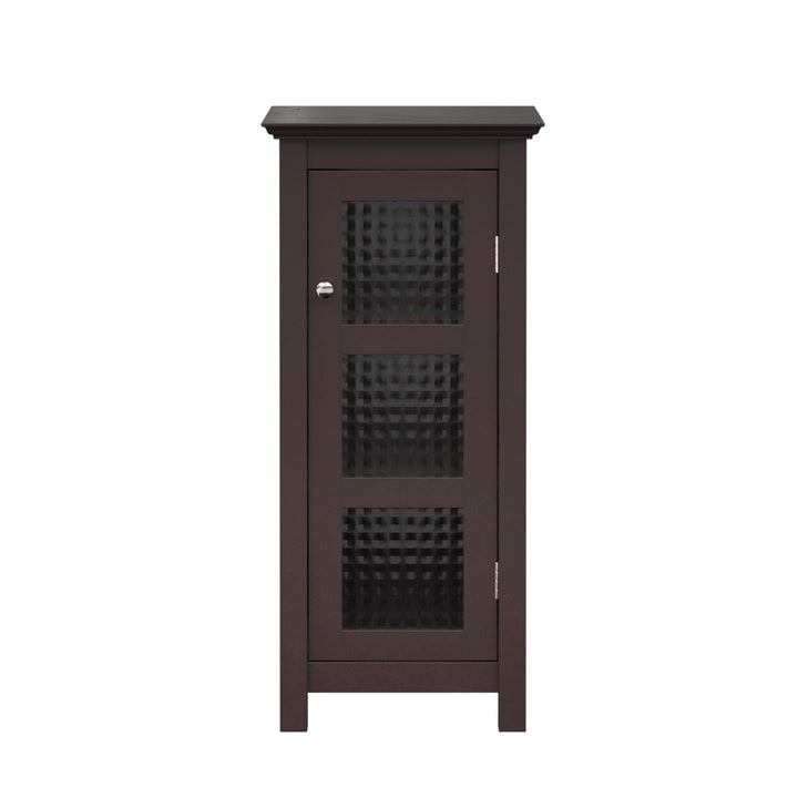 A Teamson Home Chesterfield Wooden Floor Cabinet with Waffle Glass Door, Espresso against the wall