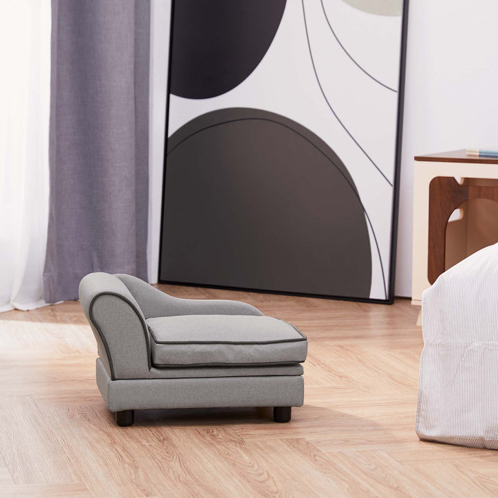 The gray pet bed shown in a bedroom.