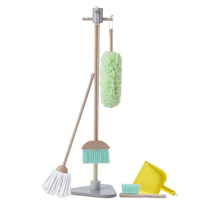 A child's cleaning set with a duster hanging from the organizational stand