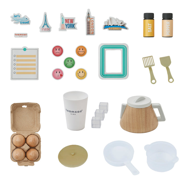 Accessories with a play kitchen including pretend food, dish ware, magnets and pans