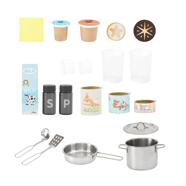 Accessories that come with play kitchen include a napkin, two coffee pods, two pretend coffee foam decorations, two pretend ice cubes, two glasses, a pretend carton of milk, salt and pepper shakers, three food canisters and a 5-piece metal cookware set