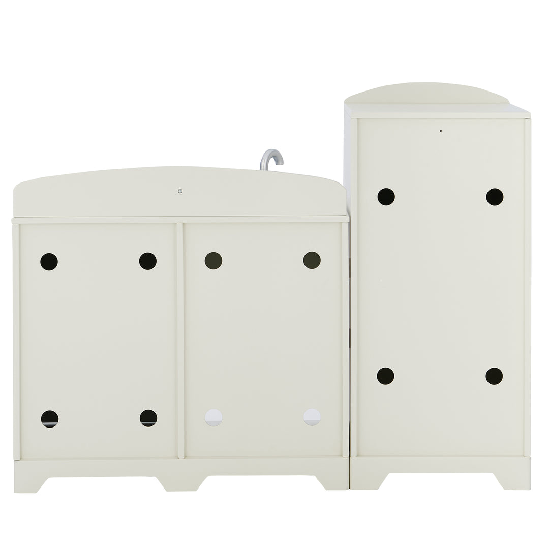 White wooden Teamson Kids Little Chef Fairfield Retro Kids Kitchen Playset with an attached vertical cabinet, featuring black polka dot decorations and round handles, crafted from easy-to-clean MDF.