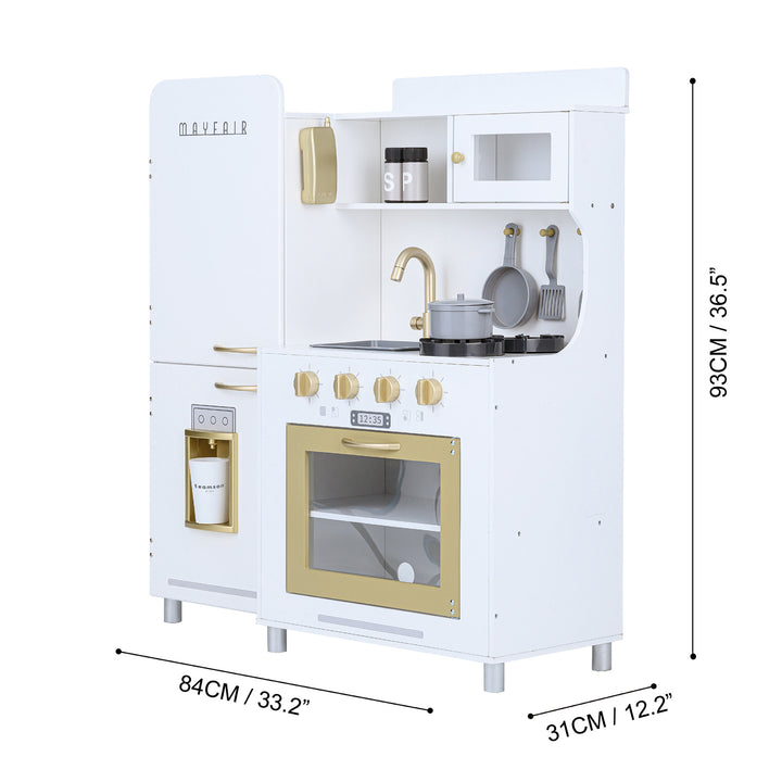 A dimensional graphic for a white and gold retro-styled play kitchen in inches and centimeters