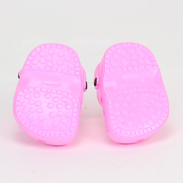 A pair of pink garden clogs for an 18" doll.