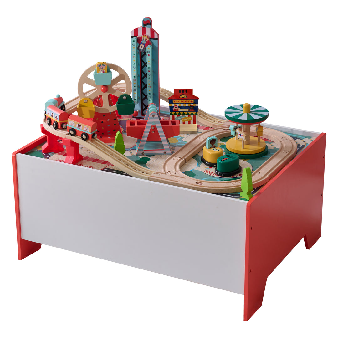 Wooden amusement park train table set with track layout, train cars, carnival rides, and red-and-white play table base.