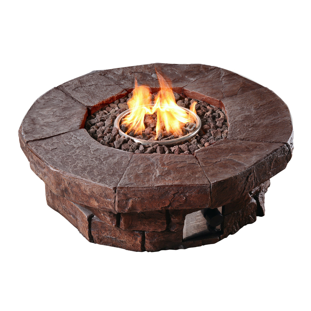 A round faux brick gas fire pit with brown lava rocks