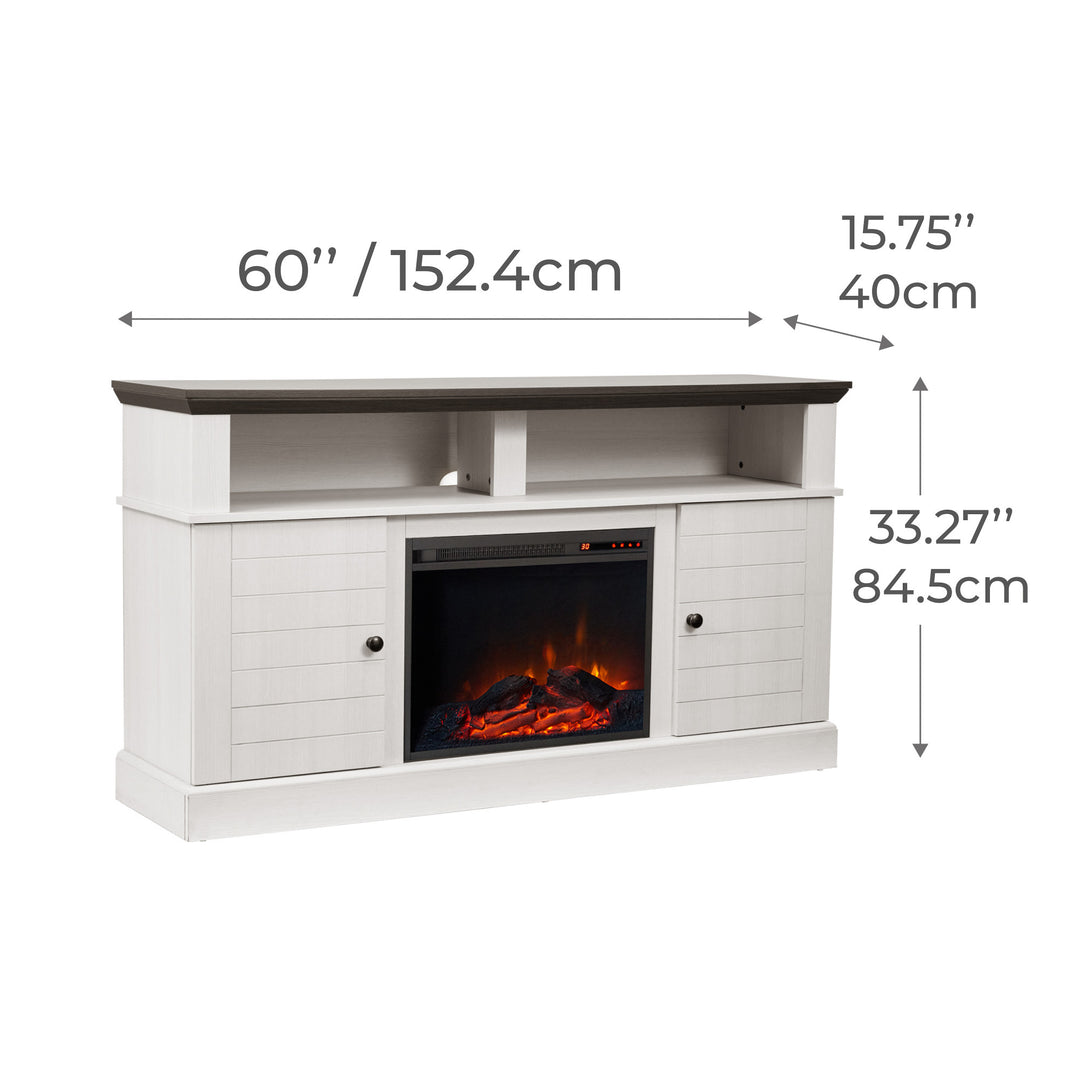 Dimensional graphic of a white entertainment center with electric fireplace in inches and centimeters