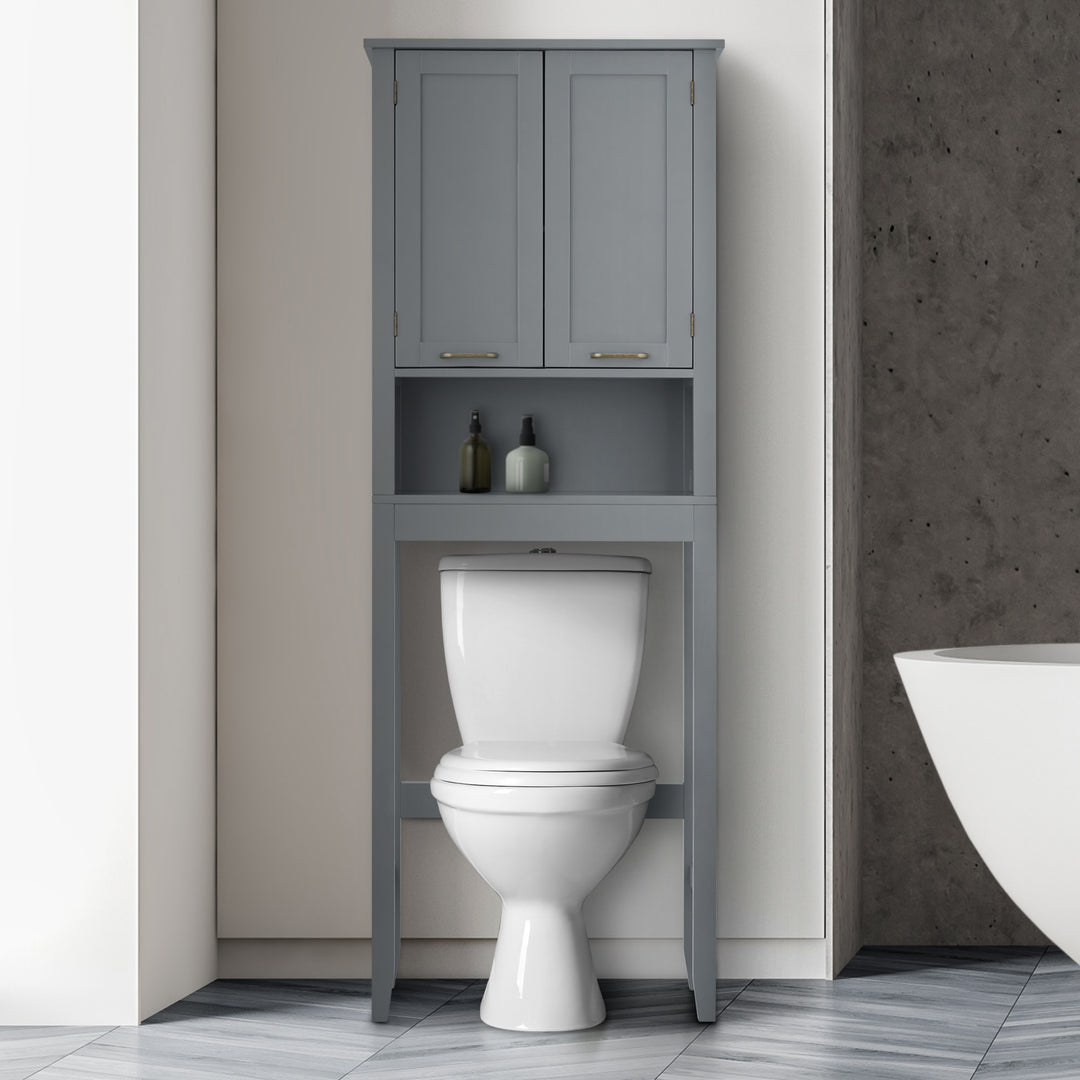 Lifestyle image of the over the toilet cabinet in a gray bathroom, lotions and soap in the exposed shelf.