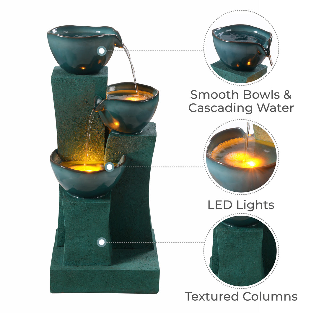 Fountain with features highlighted: smooth bowls, LED lights, textured columns.