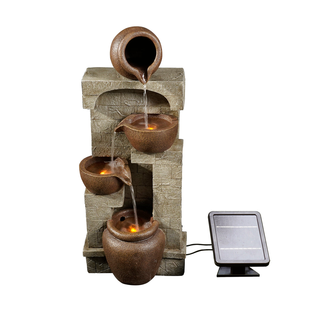 A 4-tier solar powered water fountain with faux stacked bricks and pots