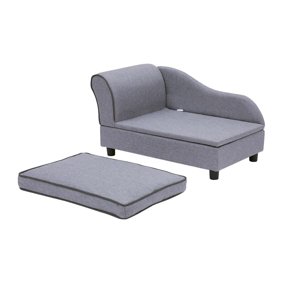 The gray day bed is shown with the cushion removed, set aside.