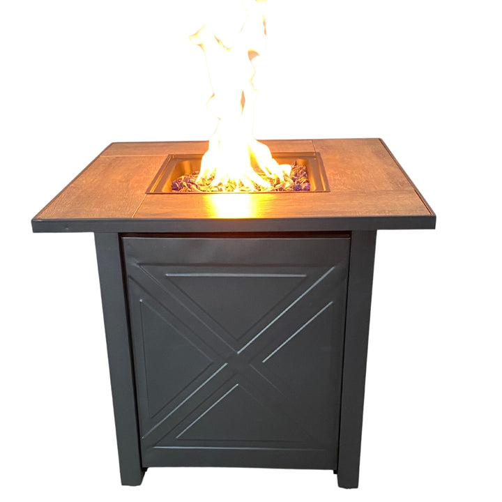 Black propane gas fire pit table with a fire burning in the middle