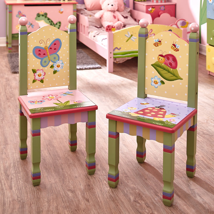 A pair of brightly colored chairs in a bedroom 