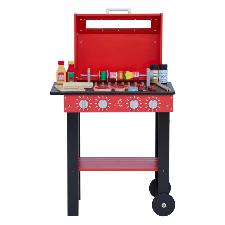 A play BBQ grill with pretend food and condiments